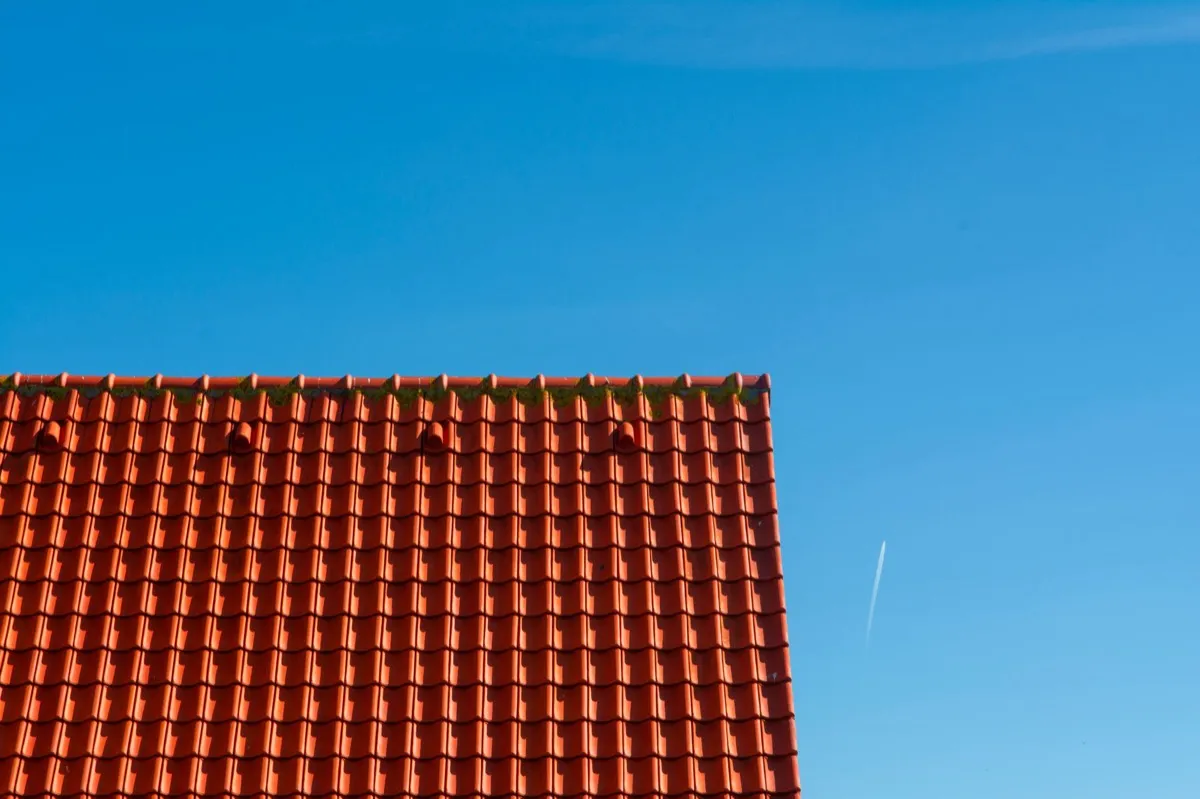 Tile roof gable in full sun, the kind of exposure that sets roof life in Toms River, NJ